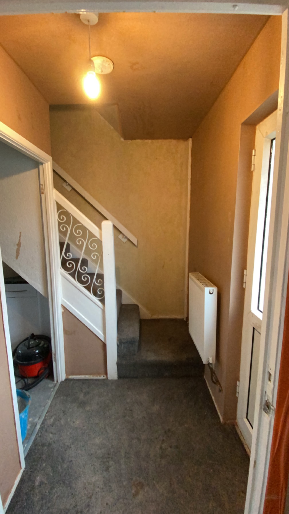Hallway and staircase with freshly plastered walls and ceiling