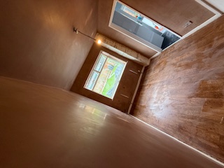 Room with full wall plastering — smooth finish on all walls