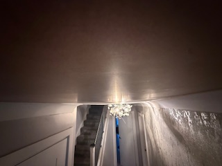 Stairwell ceiling plastering — smooth finish